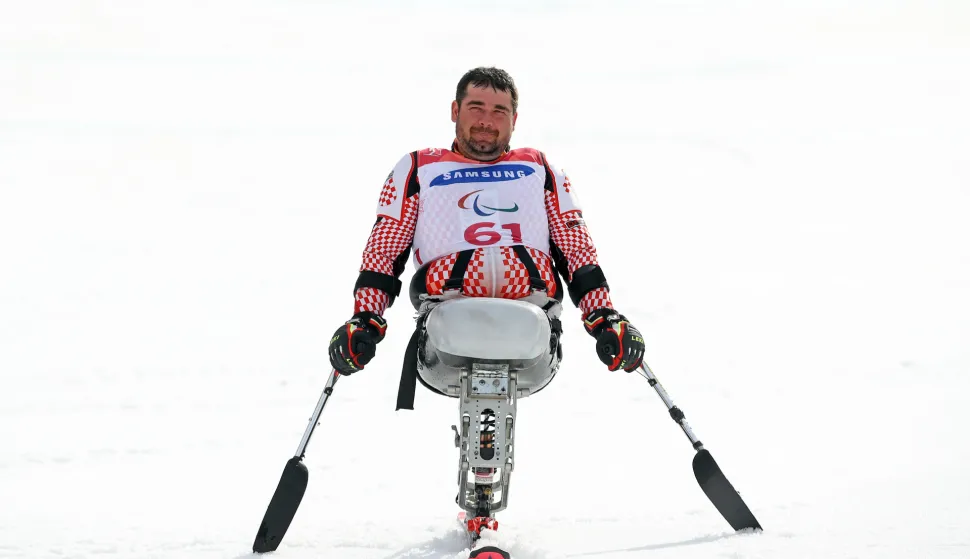Pjong?ang, 16.03.2018 - Hrvatski paraolimpijac Dino Sokolovi? osvojio je zlatnu medalju u slalomu na XII Paraolimpijskim igrama u Pjong?angu.foto HINA/ Damir SEN?AR /ds