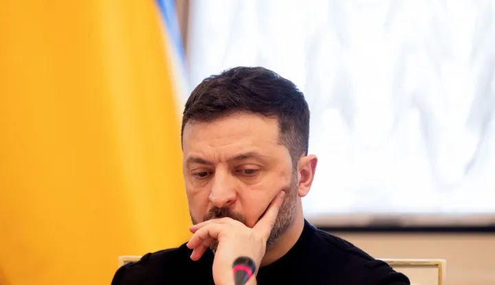 Ukraine's President Volodymyr Zelensky looks on during a briefing following a working meeting with Ukraine's Prime minister and the cabinet in Kyiv on March 5, 2026, amid the Russian invasion of Ukraine. (Photo by Tetiana DZHAFAROVA/AFP)