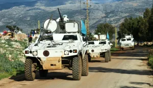 French peacekeepers of the United Nations Interim Force In Lebanon (UNIFIL) patrol at the entrance of the southern Lebanese border village of Sarada on February 24, 2026. Lebanon's army accused the Israeli military on February 24 of firing near a position it was setting up in the country's south, saying it had instructed troops to return fire. (Photo by Rabih DAHER/AFP)