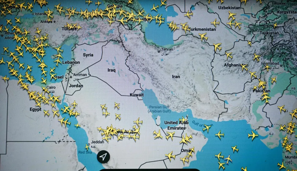 This photograph taken in Paris on March 1, 2026 shows a page on the Flightradar 24 website thats shows civilian flights avoiding Iranian and Iraqi sky. The biggest disruption to global air transport since the Covid pandemic continued on March 1, 2026, with thousands of flights affected and busy Middle Eastern hubs including Dubai and Doha shuttered as Iran lashed out after US-Israeli strikes. Iran, Iraq, Israel, Syria, Kuwait, Qatar and the United Arab Emirates had all announced at least partial closures of their skies Saturday after the US and Israel attacked Iran, bringing civilian air traffic over the Middle East to an abrupt halt. (Photo by Anna KURTH/AFP)