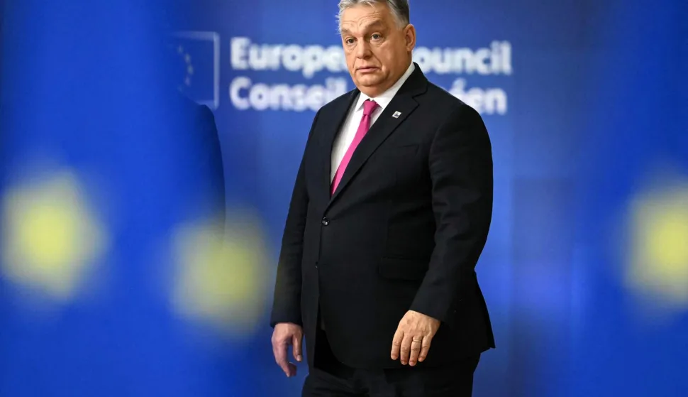 (FILES) Hungary's Prime Minister Viktor Orban arrives to attend the European Council meeting in Brussels on December 18, 2025. Hungary will block the European Union's latest package of sanctions against Russia unless Ukraine re-opens a key oil pipeline that supplies the country, Hungary's prime minister and foreign minister both said on February 22, 2026. (Photo by NICOLAS TUCAT/AFP)