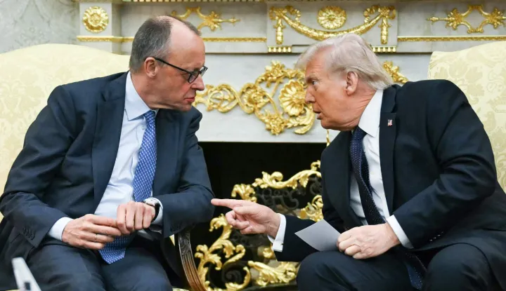 TOPSHOT - US President Donald Trump meets with German Chancellor Friedrich Merz in the Oval Office of the White House in Washington, DC on March 3, 2026. Chancellor Merz is the first European leader to visit President Trump since the United States and Israel launched their war against Iran. (Photo by ANDREW CABALLERO-REYNOLDS/AFP)