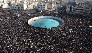 Demonstrators wave Iranian national flags as they gather for a rally in support of the new Supreme Leader at Enghelab Square in central Tehran on March 9, 2026. Iran marked the appointment of Ayatollah Mojtaba Khamenei to replace his father as its supreme leader with a new barrage of missiles against Israel and the Gulf states on March 9, as the Middle East war sent oil prices soaring. (Photo by AFP)