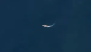 This handout image taken by the European Space Agency (ESA) on February 15, 2026 captured by the Copernicus Sentinel-1 satellite shows the US Navy's USS Abraham Lincoln (CVN-72) aircraft carrier cruising in the Arabian Sea about 700 kilometres off the coast of Iran. The USS Abraham Lincoln is one of 12 US ships already in the Middle East. The US president dispatched on February 13 a second aircraft carrier, the USS Gerald R. Ford, to the region to ratchet up military pressure on Iran. (Photo by EUROPEAN SPACE AGENCY/AFP)/RESTRICTED TO EDITORIAL USE - MANDATORY CREDIT "AFP PHOTO/ESA" - HANDOUT - NO MARKETING NO ADVERTISING CAMPAIGNS - DISTRIBUTED AS A SERVICE TO CLIENTS