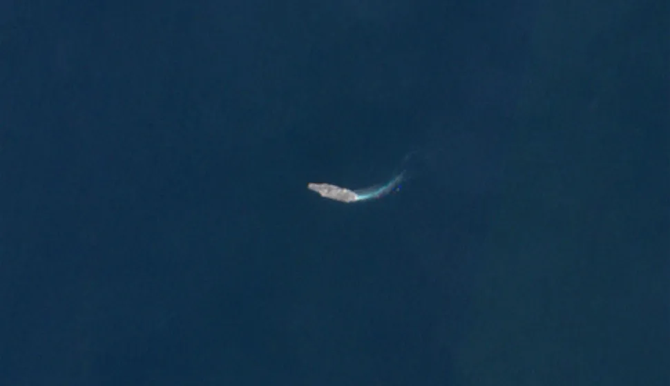 This handout image taken by the European Space Agency (ESA) on February 15, 2026 captured by the Copernicus Sentinel-1 satellite shows the US Navy's USS Abraham Lincoln (CVN-72) aircraft carrier cruising in the Arabian Sea about 700 kilometres off the coast of Iran. The USS Abraham Lincoln is one of 12 US ships already in the Middle East. The US president dispatched on February 13 a second aircraft carrier, the USS Gerald R. Ford, to the region to ratchet up military pressure on Iran. (Photo by EUROPEAN SPACE AGENCY/AFP)/RESTRICTED TO EDITORIAL USE - MANDATORY CREDIT "AFP PHOTO/ESA" - HANDOUT - NO MARKETING NO ADVERTISING CAMPAIGNS - DISTRIBUTED AS A SERVICE TO CLIENTS