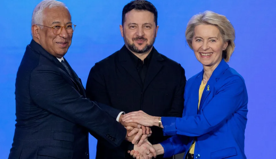 TOPSHOT - European Council President Antonio Costa (L), Ukraine's President Volodymyr Zelensky (C) and the President of the European Commission Ursula von der Leyen (R) posing for a photo during a press conference in Kyiv on February 24, 2026, as Ukraine marks the fourth anniversary of Russia's invasion. EU chief Ursula von der Leyen said on February 24, 2026 the bloc would make good on a 90-billion-euro ($106-billion) loan for Ukraine despite the Kremlin-friendly leader of Hungary, Viktor Orban, blocking the measure. (Photo by Tetiana DZHAFAROVA/AFP)