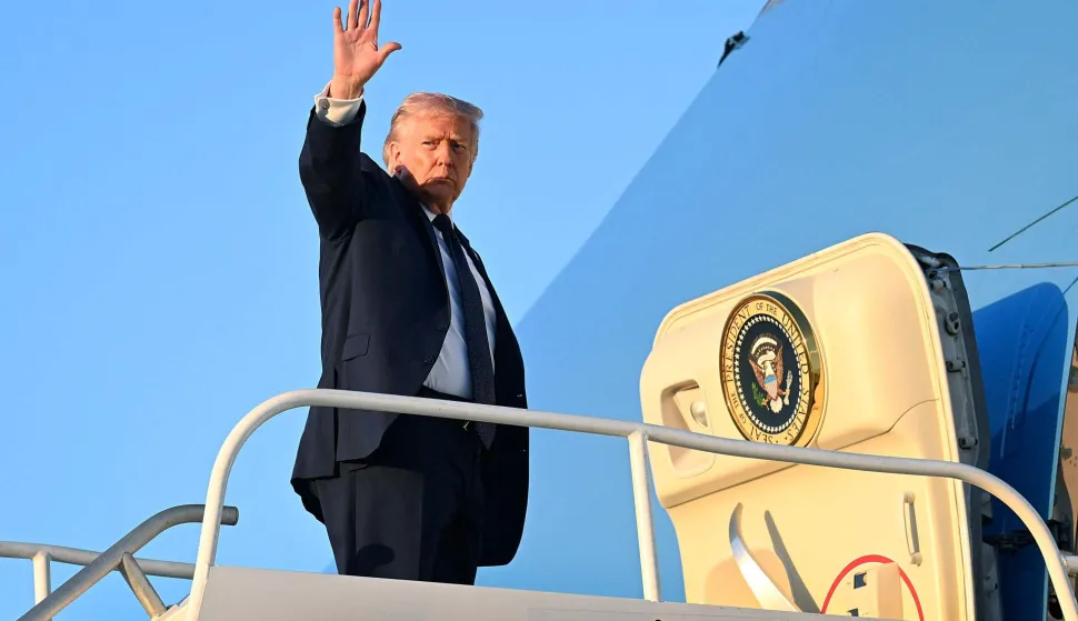 MIAMI, FLORIDA - MARCH 09: U.S. President Donald Trump boards Air Force One at Miami International Airport on March 09, 2026 in Miami, Florida. Trump was returning to Washington after meeting with House Republicans at his Doral resort to hash out the party's economic and foreign policy message ahead of the midterm elections. Roberto Schmidt/Getty Images/AFP (Photo by ROBERTO SCHMIDT/GETTY IMAGES NORTH AMERICA/Getty Images via AFP)
