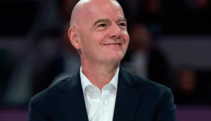 (FILES) International Association Football Federation (FIFA) President Gianni Infantino looks on at the end of the women?s singles final match, at the Qatar Open tennis tournament in Doha on February 14, 2026. FIFA President Gianni Infantino is ?very calm? about Mexico hosting the 2026 World Cup, he told AFP on February 24, 2026, after the country faced a wave of violence following the death of its biggest drug lord. (Photo by Karim JAAFAR/AFP)