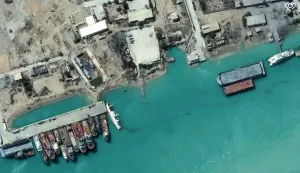This handout satellite image courtesy of Vantor shows a view of a capsized ship following airstrikes at Bushehr naval base in southern Iran along the Gulf on March 7, 2026. The United States and Israel launched strikes against Iran on February 28, sparking swift retaliation by the Islamic republic which responded with missile attacks across the region. The war has dragged in global powers, upended the world's energy and transport sectors, and brought chaos to even usually peaceful areas of the volatile region. (Photo by Satellite image &Acirc;&copy;2026 Vantor/AFP)/RESTRICTED TO EDITORIAL USE - MANDATORY CREDIT "AFP PHOTO/SATELLITE IMAGE (C) 2026 Vantor" - HANDOUT - NO MARKETING NO ADVERTISING CAMPAIGNS - DISTRIBUTED AS A SERVICE TO CLIENTS - THE WATERMARK MAY NOT BE REMOVED/CROPPED