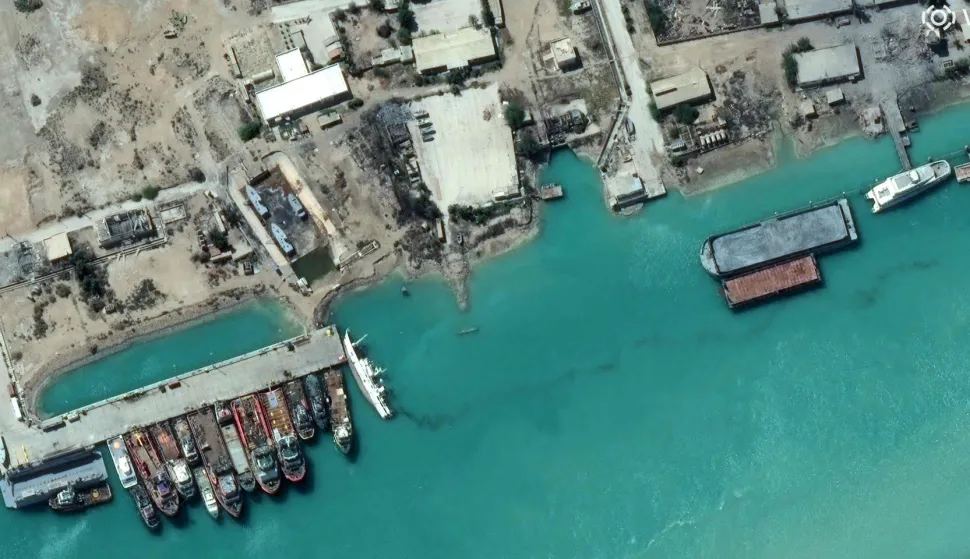 This handout satellite image courtesy of Vantor shows a view of a capsized ship following airstrikes at Bushehr naval base in southern Iran along the Gulf on March 7, 2026. The United States and Israel launched strikes against Iran on February 28, sparking swift retaliation by the Islamic republic which responded with missile attacks across the region. The war has dragged in global powers, upended the world's energy and transport sectors, and brought chaos to even usually peaceful areas of the volatile region. (Photo by Satellite image &Acirc;&copy;2026 Vantor/AFP)/RESTRICTED TO EDITORIAL USE - MANDATORY CREDIT "AFP PHOTO/SATELLITE IMAGE (C) 2026 Vantor" - HANDOUT - NO MARKETING NO ADVERTISING CAMPAIGNS - DISTRIBUTED AS A SERVICE TO CLIENTS - THE WATERMARK MAY NOT BE REMOVED/CROPPED