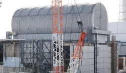 This photo taken on January 27, 2026 shows the exterior of the Fukushima Daiichi Nuclear Power Plant's Unit 3, seen in Okuma Town, Fukushima Prefecture. (Photo by JIJI PRESS/AFP)/Japan OUT