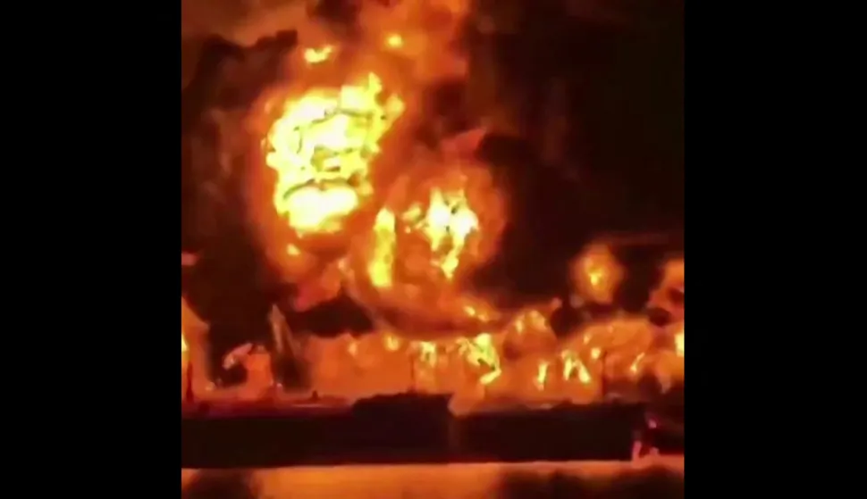 This video grab taken from UGC images posted on social media on March 12, 2026, shows two oil tankers on fire off the coast of Iraq. An attack on two oil tankers near Iraq killed at least one crew member, an Indian national, as Iran pressed a campaign aimed at disrupting global energy markets in retaliation for US and Israeli strikes. (Photo by various sources/AFP)/RESTRICTED TO EDITORIAL USE - MANDATORY CREDIT AFP - SOURCE: UGC/UNKNOWN - DISTRIBUTED AS A SERVICE TO CLIENTS - NO RESALE