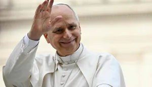 Pope Leo XIV waves to the crowd during the weekly general audience at St Peter's Square in The Vatican on March 11, 2026. (Photo by Tiziana FABI/AFP)