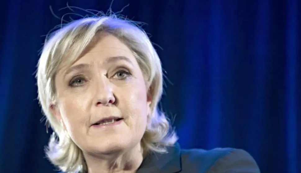 epa05824437 (FILE) - Leader of France's far-right Front National political party and candidate for the 2017 French presidential elections, Marine Le Pen, holds a news conference in Paris, France, 26 January 2017 (reissued 02 March 2017). Le Pen lost her EU immunity after a European Parliament vote on 02 March 2017 in connection with tweets of pictures showing IS violence. EPA/IAN LANGSDON