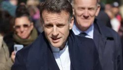 France's President Emmanuel Macron arrives to vote during the first round of France's 2026 municipal elections in Le Touquet, northern France, on March 15, 2026. (Photo by Ludovic MARIN/AFP)