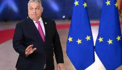 (FILES) Hungary's Prime Minister Viktor Orban reacts as he arrives to attend the European Council meeting in Brussels on December 18, 2025. Hungary will block the European Union's latest package of sanctions against Russia unless Ukraine re-opens a key oil pipeline that supplies the country, Hungary's prime minister and foreign minister both said on February 22, 2026. (Photo by NICOLAS TUCAT/AFP)