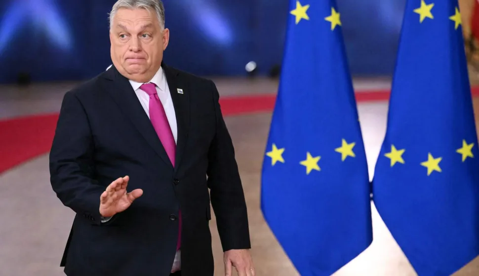 (FILES) Hungary's Prime Minister Viktor Orban reacts as he arrives to attend the European Council meeting in Brussels on December 18, 2025. Hungary will block the European Union's latest package of sanctions against Russia unless Ukraine re-opens a key oil pipeline that supplies the country, Hungary's prime minister and foreign minister both said on February 22, 2026. (Photo by NICOLAS TUCAT/AFP)