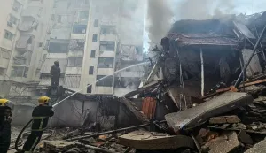 Firefighters extinguish a fire that swept through the site of an Israeli airstrike targeting Beirut?s southern suburbs, in the al-Kafaat neighborhood, on March 17, 2026. Israel launched a wave of strikes on Tehran and Beirut on March 17, while attacks in Baghdad drew neighbouring Iraq deeper into the Middle East war that has sparked economic turmoil across the globe. (Photo by AFP)