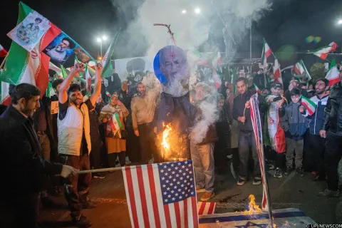 Protesters burn Israeli, U.S. flags and images of Israeli Prime Minister Benjamin Netanyahu during a demonstration in Tehran, Iran, denouncing recent attacks and expressing support for Iran's armed forces in Tehran, Iran on Tuesday, March 17, 2026, waving national flags to commemorate the victims of the warship Dina, which was sunk by the United States in the Indian Ocean on March 4, 2026. Photo by/UPI. Photo via Newscom Photo: UPI/NEWSCOM