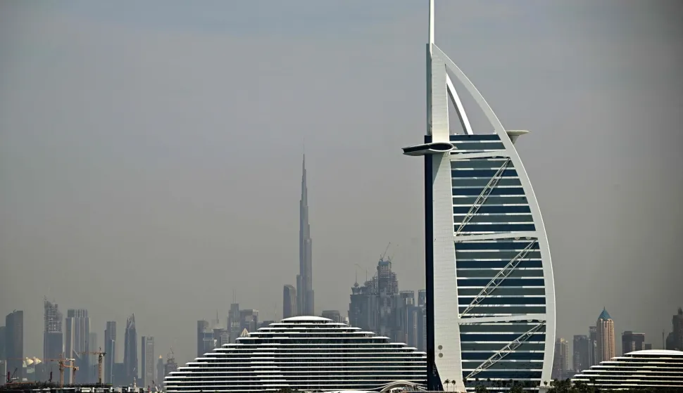 The city skyline is pictued in Dubai on March 11, 2026. The oil-rich Gulf has borne the brunt of Iran's attacks in response to US-Israeli strikes that sparked the Middle East war, with Tehran targeting US assets but also civilian infrastructure. (Photo by Giuseppe CACACE/AFP)
