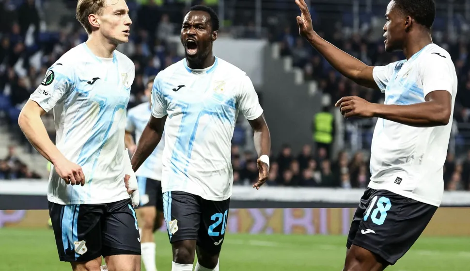 Rijeka's Croatian midfielder #10 Toni Fruk (L) celebrates with teammates after scoring his team's first goal during the UEFA Europa Conference League last 16 second leg football match between RC Strasbourg Alsace and Rijeka at the Stade de la Meinau in Strasbourg, eastern France, on March 19, 2026. (Photo by Frederick FLORIN/AFP)