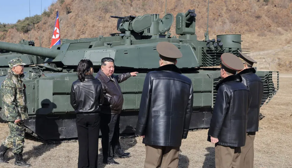 This picture taken on March 19, 2026 and released by North Korea's official Korean Central News Agency (KCNA) via KNS on March 20, 2026 shows North Korean leader Kim Jong Un and his daughter Kim Ju Ae visiting the Pyongyang Training Base No. 60 under the Capital City Defence Corps of the North Korean's Army. (Photo by KCNA VIA KNS/AFP)/South Korea OUT/---EDITORS NOTE--- RESTRICTED TO EDITORIAL USE - MANDATORY CREDIT "AFP PHOTO/KCNA VIA KNS" - NO MARKETING NO ADVERTISING CAMPAIGNS - DISTRIBUTED AS A SERVICE TO CLIENTSTHIS PICTURE WAS MADE AVAILABLE BY A THIRD PARTY. AFP CAN NOT INDEPENDENTLY VERIFY THE AUTHENTICITY, LOCATION, DATE AND CONTENT OF THIS IMAGE./
