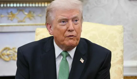US President Donald Trump speaks during a bilateral meeting with the Taoiseach of Ireland Miche?l Martin in the Oval Office of the White House in Washington, DC on March 17, 2026. The Irish prime minister arrived in the United States March 13 for an annual St Patrick's Day trip under pressure to talk tough to US President Donald Trump amid the Iran war. (Photo by Jim WATSON/AFP)