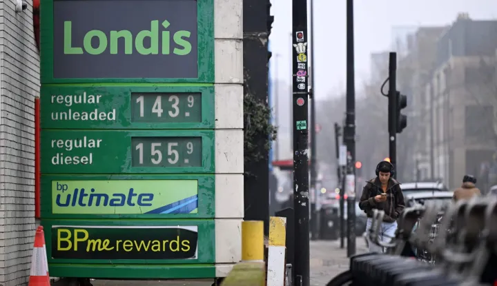 The price per litre of unleaded petrol and diesel fuels are pictured outside a BP petrol station in east London, on March 9, 2026. Stock markets plunged Monday as oil and gas prices soared on fears about supplies from the Middle East with the US-Israeli war against Iran continuing into a second week with no sign of letting up. (Photo by Paul ELLIS/AFP)