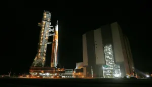 Mobile launcher 1 containing the massive Artemis II Space Launch System (SLS) rocket and Orion spacecraft rolls out from the Vehicle Assembly Building to Launch Pad 39B at the Kennedy Space Center in Cape Canaveral, Florida on March 20, 2026. After numerous delays NASA announced their intention to finally send four astronauts back to the moon for the first time in more than 50 years. Their shakedown mission to lunar space is now being targeted for April 1. (Photo by Gregg Newton/AFP)