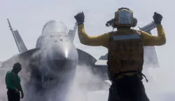 TOPSHOT - This US Navy handout photo released by US Central Command public affairs shows a F/A-18F Super Hornet, attached to Strike Fighter Squadron (VFA) 41, preparing to launch from the flight deck of Nimitz-class aircraft carrier USS Abraham Lincoln (CVN 72) in support of Operation Epic Fury, from an undisclosed location on February 28, 2026. Three members of the US military have been killed and five others wounded in the operation against Iran, the Pentagon said on March 1, announcing the first American deaths in the US-Israeli campaign that killed the Islamic republic's supreme leader. (Photo by US NAVY/US CENTRAL COMMAND/AFP)/RESTRICTED TO EDITORIAL USE - MANDATORY CREDIT "AFP PHOTO/US NAVY and US CENTRAL COMMAND/HANDOUT" - HANDOUT - NO MARKETING NO ADVERTISING CAMPAIGNS - DISTRIBUTED AS A SERVICE TO CLIENTS