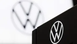 A photograph shows a logo of German automobile manufacturing company Volkswagen displayed during a press opening of the 102th edition of the Brussels Motor Show, at Brussels Expo, in Brussels on January 9, 2026. (Photo by BENOIT DOPPAGNE/Belga/AFP)/Belgium OUT