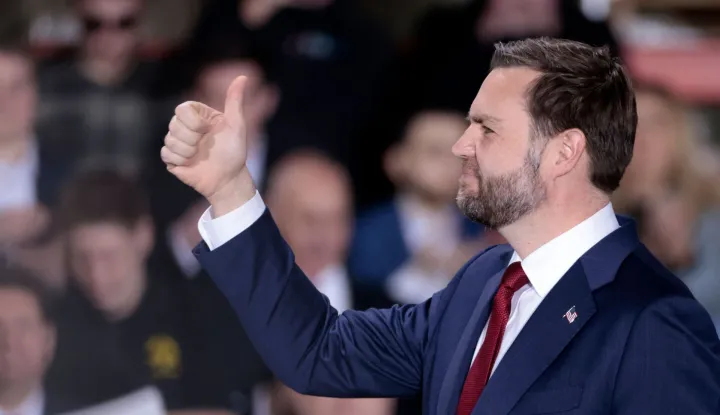 US Vice President JD Vance gives a thumb's up as he speaks during a visit to the Engineering Design Services Inc. manufacturing facility in Auburn Hills, Michigan on March 18, 2026. (Photo by JEFF KOWALSKY/AFP)