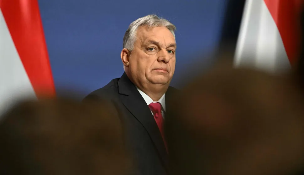 (FILES) Hungary's Prime Minister Viktor Orban answers a journalist's question during his press conference in the Carmelita monastery, the office of the Hungarian premier, in Budapest, Hungary, on January 5, 2026. Hungarian Prime Minister Viktor Orban on February 14, 2026 vowed to press on with his crackdown on "pseudo-civil organisations, bought journalists, judges, politicians", saying the work was only "half done". The nationalist leader is facing the toughest challenge since returning to power in 2010, with his Fidesz party trailing the opposition TISZA party in opinion polls ahead of parliamentary elections on April 12. (Photo by Attila KISBENEDEK/AFP)