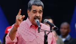 (FILES) Venezuela's President Nicolas Maduro speaks during a demonstration for the swearing-in of Bolivarian committees in Caracas on November 15, 2025. In an interview on January 1, 2026, Venezuelan President Nicol?s Maduro avoided confirming or denying an alleged attack on a narcotics facility that, according to Donald Trump, the United States recently carried out on Venezuelan territory. (Photo by AFP)