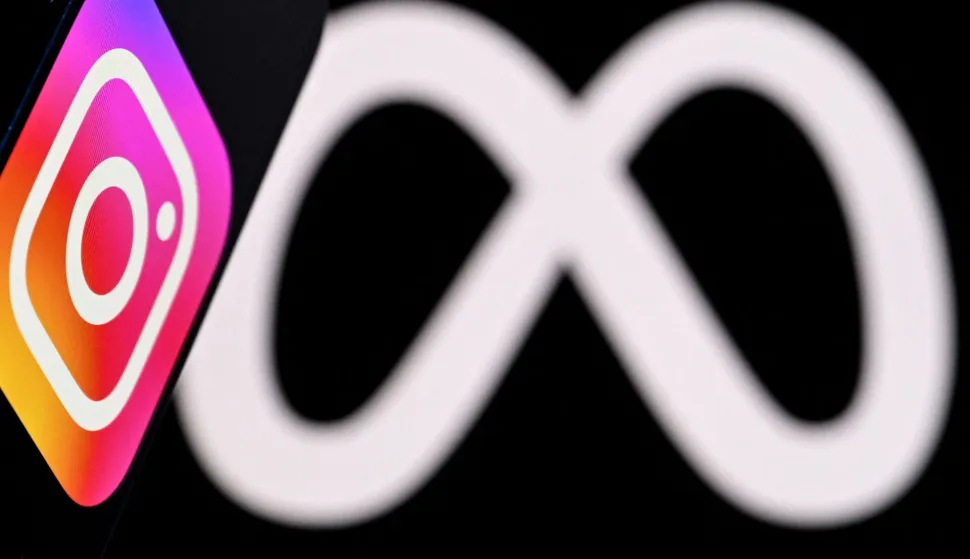 (FILES) This photo illustration created on January 9, 2025, in Frankfurt am Main, western Germany, shows US social network Instagram logo displayed on a smartphone in front of the media giant Meta's logo on a laptop screen. A Los Angeles jury on March 25 found Meta and YouTube liable for harming a young woman through the addictive design of their social media platforms, ordering the companies to pay $3 million in damages and opening the door to potentially far larger punitive awards. The jury answered yes to all seven questions on verdict forms for both companies, finding that Meta and YouTube were negligent in the design and operation of their platforms and that their negligence was a substantial factor in causing harm to the plaintiff. (Photo by Kirill KUDRYAVTSEV/AFP)