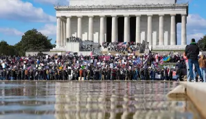 Demonstrators gather near the Lincoln Memorial during the "No Kings" national day of protest in Washington, DC, on March 28, 2026. Nationwide protests against US President Donald Trump are expected Saturday as millions of people vent fury over what they see as his authoritarian bent and other forms of cruel, law-trampling governance. It is the third time in less than a year that Americans will take to the streets as part of a grassroots movement called "No Kings," the most vocal and visual conduit for opposition to Trump since he began his second term in January 2025. (Photo by Ken Cedeno/AFP)