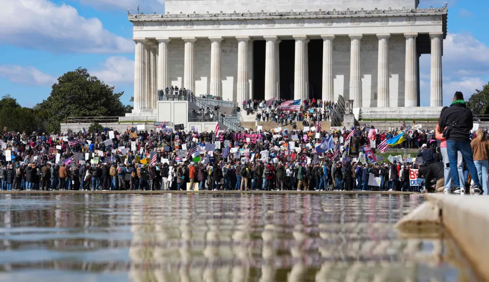 Demonstrators gather near the Lincoln Memorial during the "No Kings" national day of protest in Washington, DC, on March 28, 2026. Nationwide protests against US President Donald Trump are expected Saturday as millions of people vent fury over what they see as his authoritarian bent and other forms of cruel, law-trampling governance. It is the third time in less than a year that Americans will take to the streets as part of a grassroots movement called "No Kings," the most vocal and visual conduit for opposition to Trump since he began his second term in January 2025. (Photo by Ken Cedeno/AFP)