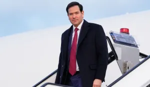 US Secretary of State Marco Rubio disembarks from his plane, on February 12, 2026, at Munich airport, before attending the Munich Security Conference. (Photo by Alex Brandon/POOL/AFP)