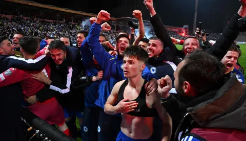 Bosnia-Herzegovina's forward #20 Esmir Bajraktarevic celebrates after scoring during the penalty shoot-out to win the FIFA World Cup 2026 European qualification final football match between Bosnia-Herzegovina and Italy at the Bilino-Polje stadium in Zenica on March 31, 2026. (Photo by Elvis BARUKCIC/AFP)