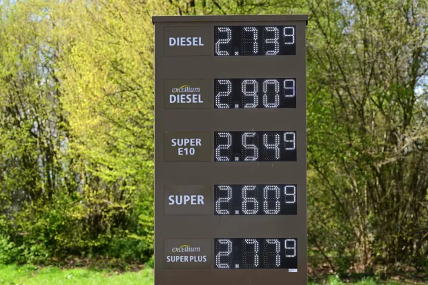 A digital display shows the price of petrol at a petrol station at the motorway A43 near Muenster on April 1, 2026. Oil and natural gas prices have surged since the end of February 2026, when the United States and Israel began attacking Iran, plunging the Middle East into turmoil. (Photo by Ina FASSBENDER/AFP)