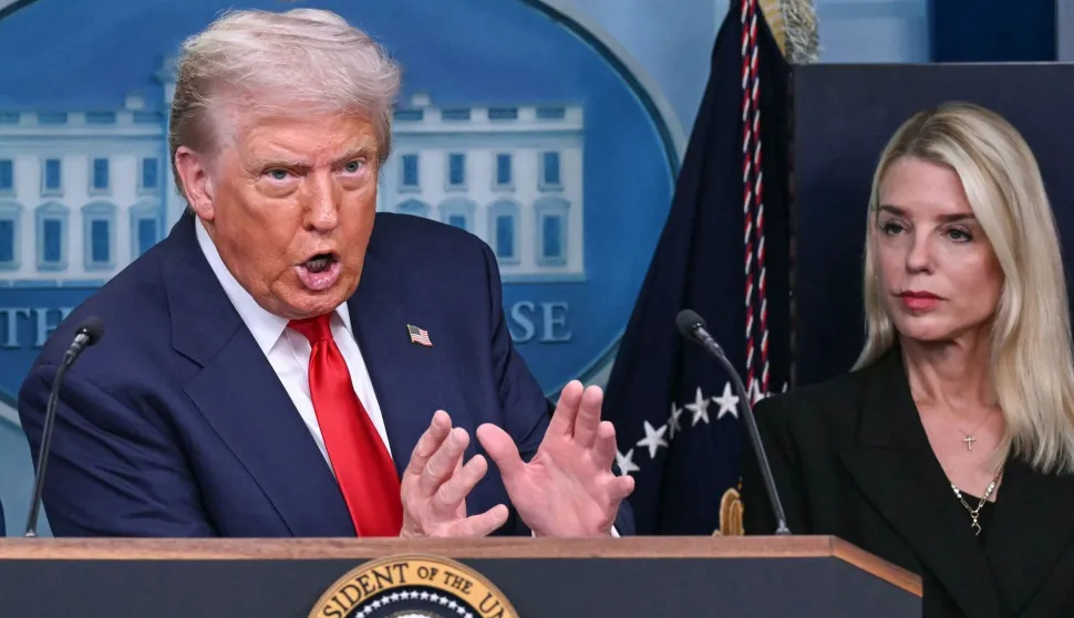 (FILES) US President Donald Trump, alongside Attorney General Pam Bondi (R), speaks during a news conference to discuss crime in Washington, DC, in the Brady Press Briefing Room at the White House in Washington, DC, on August 11, 2025. US media reported on April 2, 2026, that US President Donald Trump has fired Attorney General Pam Bondi. (Photo by ANDREW CABALLERO-REYNOLDS/AFP)
