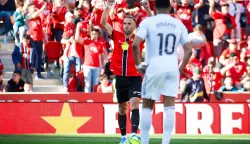 Real Mallorca's Kosovo forward #07 Vedat Muriqi celebrates scoring his team's second goal during the Spanish league football match between RCD Mallorca and Real Madrid CF at Mallorca Son Moix Stadium in Palma de Mallorca on April 4, 2026. (Photo by JAIME REINA/AFP)