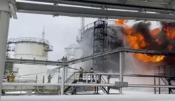 epa11089529 A still image taken from a handout video provided &nbsp;by the Russian Emergencies Ministry Press-Service shows Russian firefighters extinguishing a fire following a reported drone attack on the territory of the Klintsevskaya oil depot, near Bryansk, Bryansk region, Russia, 19 January 2024. Oil storage tanks caught fire after a Ukrainian drone attacked an oil depot in Klintsy, Russia's Bryansk region, regional governor Aleksandr Bogomaz wrote on telegram, adding that there were no casualties in the incident. Some 32 residents of the private sector were temporarily evacuated and more than 140 people were deployed to fight the fire. EPA/RUSSIAN EMERGENCIES MINISTRY HANDOUT -- BEST QUALITY AVAILABLE -- HANDOUT EDITORIAL USE ONLY/NO SALES HANDOUT EDITORIAL USE ONLY/NO SALES