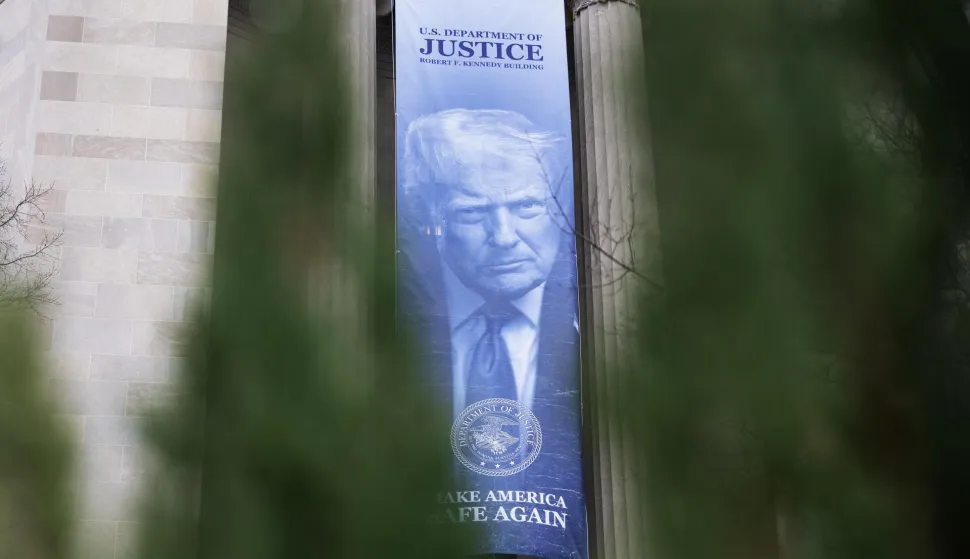 UNITED STATES - FEBRUARY 23: A banner depicting President Donald Trump hangs along Pennsylvania Avenue, NW, on the Department of Justice building on Monday, February 23, 2026. (Tom Williams/CQ Roll Call/Sipa USA) Photo: CQ-Roll Call/SIPA USA