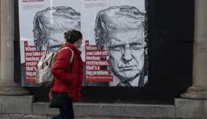 A woman walks past a wall poster in Washington, DC, on January 30, 2026, that warns of the impending expiration of the New START treaty. As the last remaining limit on U.S. and Russian nuclear weapons, the poster quotes President Trump, who has said it is ?not an agreement you want expiring.? (Photo by Probal Rashid/Sipa USA) Photo: Probal Rashid/SIPA USA
