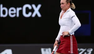 Croatia's Donna Vekic reacts on a point to Russia's Mirra Andreeva during their women's singles match on day two of the Australian Open tennis tournament in Melbourne on January 19, 2026. (Photo by Martin KEEP/AFP)/-- IMAGE RESTRICTED TO EDITORIAL USE - STRICTLY NO COMMERCIAL USE --