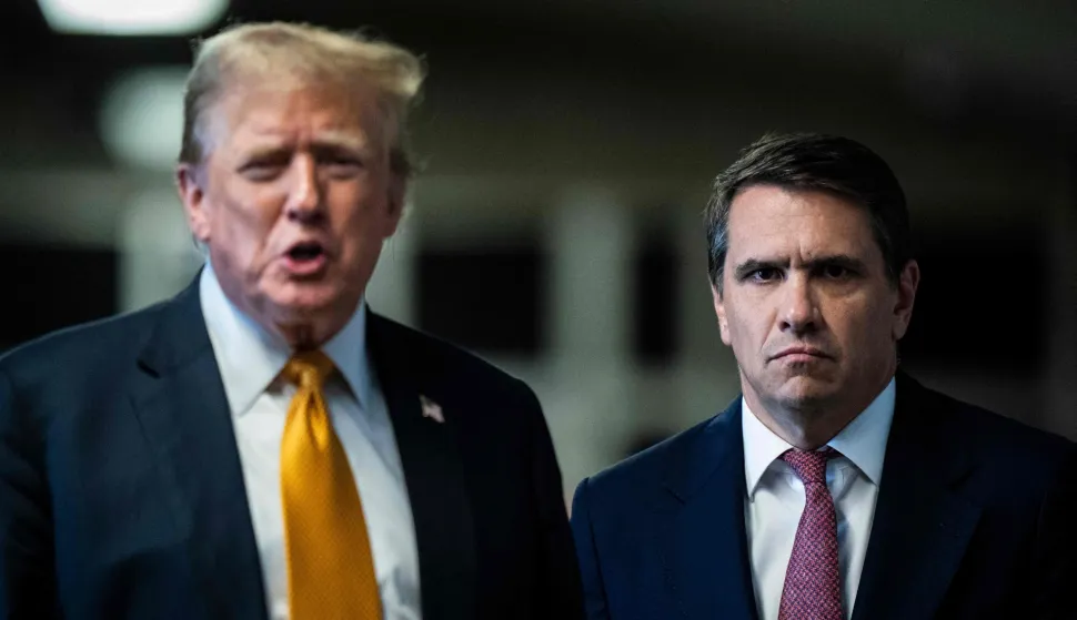 (FILES) Former US President and Republican presidential candidate Donald Trump, with attorney Todd Blanche (R), speaks to the press after the 12 jurors in his criminal trial began deliberating at Manhattan Criminal Court in New York City on May 29, 2024. US media reported on April 2, 2026, that US President Donald Trump has fired Attorney General Pam Bondi. CNN and other US outlets said Deputy Attorney General Todd Blanche, Trump's former personal lawyer, would serve as acting attorney general. (Photo by Jabin Botsford/AFP)