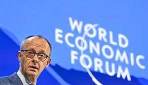 Germany's Chancellor Friedrich Merz delivers a special address during the World Economic Forum (WEF) annual meeting in Davos on January 22, 2026. The World Economic Forum takes place in Davos from January 19 to January 23, 2026. (Photo by Fabrice COFFRINI/AFP)
