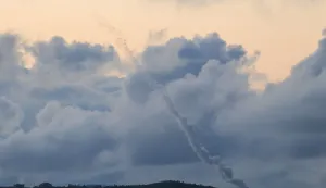 A photograph taken from the southern Lebanese area of Marjeyoun shows trails of rockets fired from Lebanon towards Israel on April 6, 2026. Lebanon was drawn into the Middle East war in early March when Iran-backed militant group Hezbollah attacked Israel in response to the killing of the Iranian supreme leader during US-Israeli strikes on February 28. (Photo by AFP)/