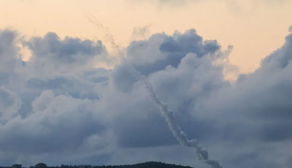 A photograph taken from the southern Lebanese area of Marjeyoun shows trails of rockets fired from Lebanon towards Israel on April 6, 2026. Lebanon was drawn into the Middle East war in early March when Iran-backed militant group Hezbollah attacked Israel in response to the killing of the Iranian supreme leader during US-Israeli strikes on February 28. (Photo by AFP)/